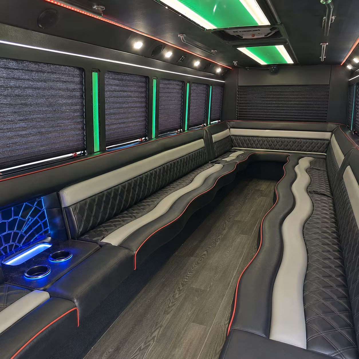 Passenger seating aboard a party bus rental serving Durham